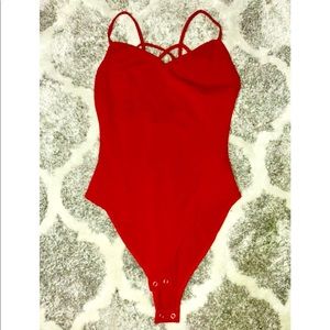 Women red bodysuit